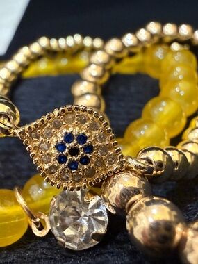 Gold-Tone Yellow Beaded Evil Eye Bracelet with Blue Accents 
💙🙏💙🙏